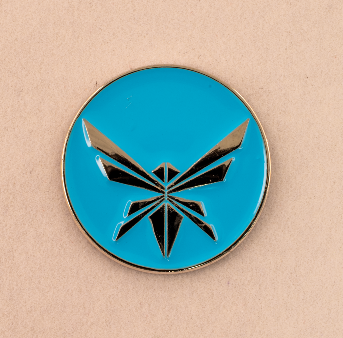 Firefly golf ball marker in packaging box